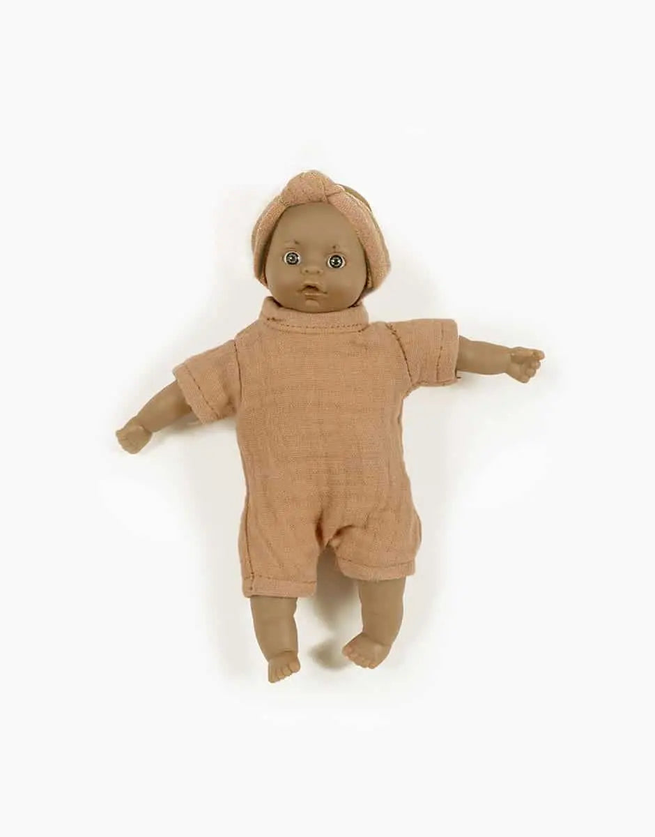 Minis Pia Baby Doll with Light Eyes in Brown Sugar Bodysuit and Headband  Minikane   